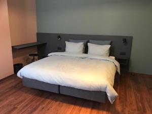 Ένα ή περισσότερα κρεβάτια σε δωμάτιο στο B&B Inn Between