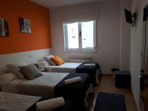A bed or beds in a room at Ultreia
