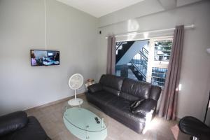 Posezení v ubytování Donfarsha Apartments