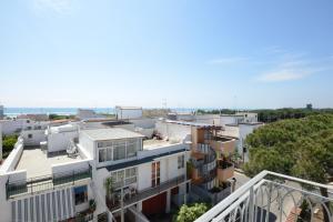 an aerial view of a city with buildings at Case Sangiorgio in Ginosa Marina