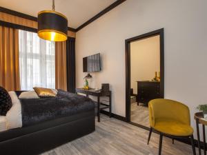 TV a/nebo společenská místnost v ubytování Golden Prague Rooms