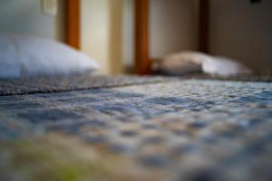Postel nebo postele na pokoji v ubytování Lira Hostel