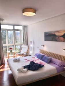 Ένα ή περισσότερα κρεβάτια σε δωμάτιο στο Apartamento PioXII Center