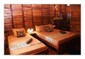 Letto o letti in una camera di Sun and Green Eco Lodge - Dambulla