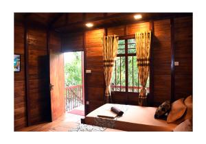 Postel nebo postele na pokoji v ubytování Sun and Green Eco Lodge - Dambulla