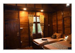 Letto o letti in una camera di Sun and Green Eco Lodge - Dambulla