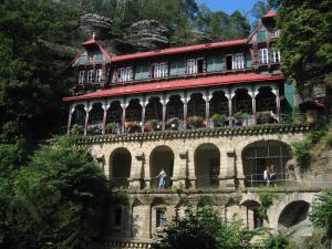 a building on the side of a mountain at Apartment Šedivý in Krásná Lípa