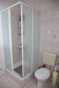 Kúpeľňa v ubytovaní Virág Apartman