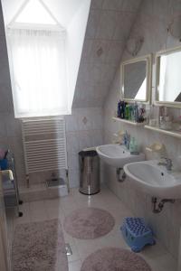 Kúpeľňa v ubytovaní Virág Apartman
