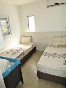 Cama o camas de una habitación en Moab Palaces