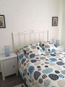 Postel nebo postele na pokoji v ubytování Casa rural Camelle Casa dos avós