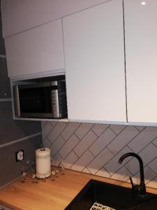 Kuchyňa alebo kuchynka v ubytovaní Apartament Superior Maloves Władysławowo