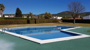 a swimming pool in a yard with at Acacies 25 in Torroella de Montgrí