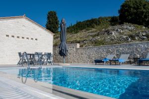 The swimming pool at or close to Kampaki Stone Houses