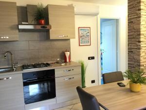 Η κουζίνα ή μικρή κουζίνα στο Appartamento Oristano città +13 φωτογραφίες