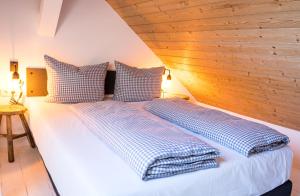 Postel nebo postele na pokoji v ubytování Das Nordberg Guesthouse