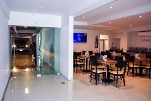 TV a/nebo společenská místnost v ubytování Hotel Ht Ole