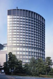 a tall building with a lot of windows at Hotel Grand Arc Hanzomon in Tokyo