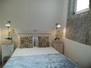 Llit o llits en una habitació de Molarinho Heritage