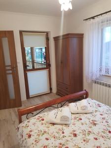 Posteľ alebo postele v izbe v ubytovaní Domki i Pokoje u Borsa