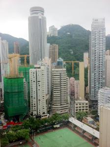 Nespecifikovaný výhled na destinaci Hongkong nebo výhled na město při pohledu z hotelu