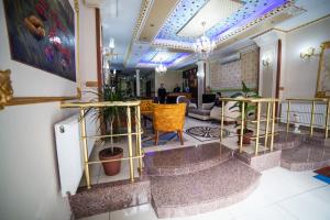 a lobby of a hotel with plants on the floor at istanbul duhok hotel in Istanbul