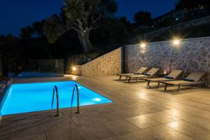 The swimming pool at or close to Kampaki Stone Houses