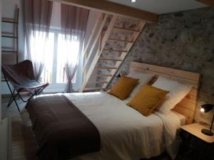 Postel nebo postele na pokoji v ubytování la feda gîte Pyrénées Ariégeoises