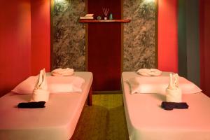 Katil atau katil-katil dalam bilik di Appleton Boutique Hotel Mactan Cebu