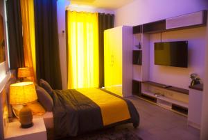 TV a/nebo společenská místnost v ubytování Studio 103, Ebene Square