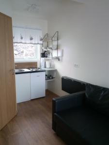 A kitchen or kitchenette at Vatnsás 10
