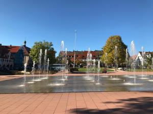 a group of water fountains in a park at City Flat gegenüber Kurhaus, Zentrum Freudenstadt in Freudenstadt