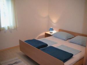 Giường trong phòng chung tại Apartments Nanini