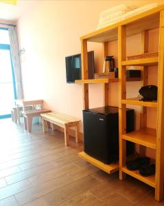 TV a/nebo společenská místnost v ubytování Love Ocean & Happy Bay HomeStay + 37 fotografií