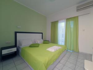 A bed or beds in a room at Studios Magda