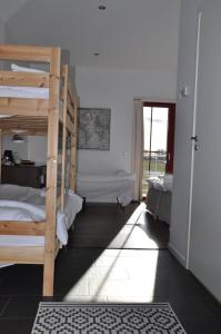 Postel nebo postele na pokoji v ubytování Hotel Bella Luna
