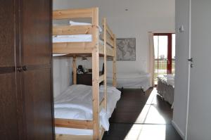 Postel nebo postele na pokoji v ubytování Hotel Bella Luna