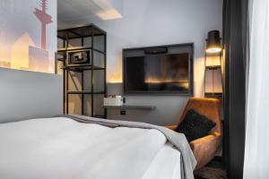 Cama ou camas em um quarto em Holiday Inn - the niu, Charly Frankfurt City by IHG