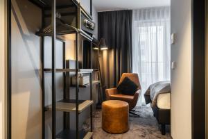 Uma área de estar em Holiday Inn - the niu, Charly Frankfurt City by IHG