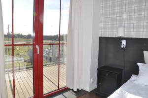 Postel nebo postele na pokoji v ubytování Hotel Bella Luna