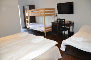 Postel nebo postele na pokoji v ubytování Hotel Bella Luna
