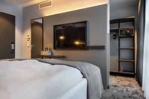 Cama ou camas em um quarto em Holiday Inn - the niu, Charly Frankfurt City by IHG