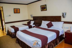Postel nebo postele na pokoji v ubytování Utalii Hotel + 24 fotografií