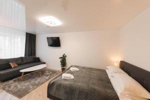 Posteľ alebo postele v izbe v ubytovaní M&M apartment
