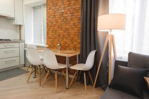Kuchyňa alebo kuchynka v ubytovaní M&M apartment + 10 fotografií