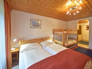 Postel nebo postele na pokoji v ubytování Fischerhof Appartements