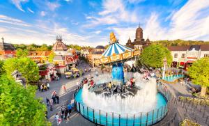 an overhead view of a amusement park with a fountain at Hotel Matamba, Phantasialand Erlebnishotel in Brühl