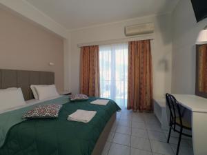 A bed or beds in a room at Studios Magda