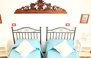 Voodi või voodid majutusasutuse Stagnone Kitesurf Paradise toas