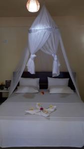 Ένα ή περισσότερα κρεβάτια σε δωμάτιο στο Pele's Place +66 φωτογραφίες